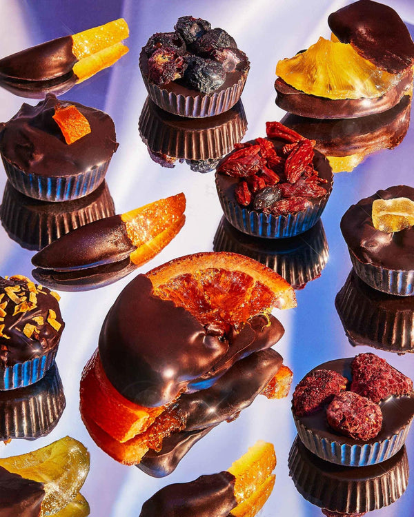 Chocolate covered fruit on mirror