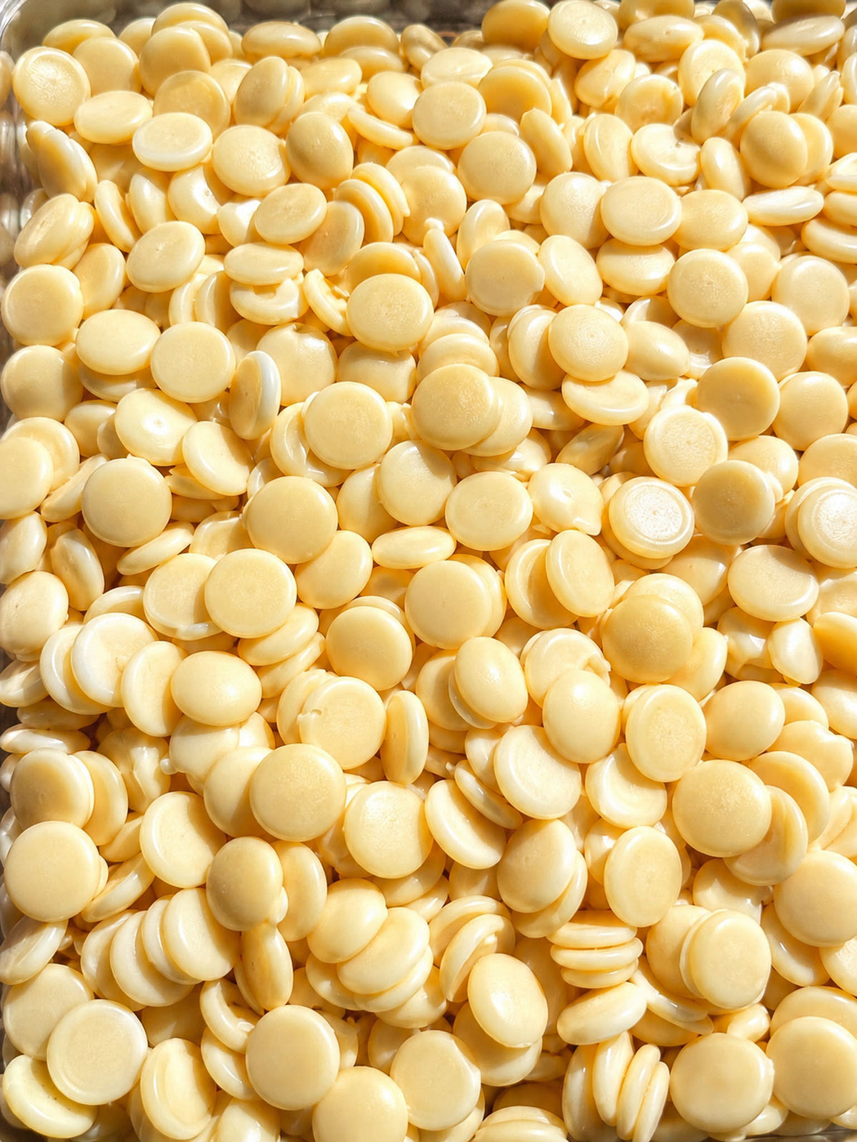 Gourmet White Chocolate Chips in bulk by Compartes Chocolatier. Handmade in Los Angeles, these pantry ingredients of premium white chocolate baking chips make the ultimate cookie ingredient.