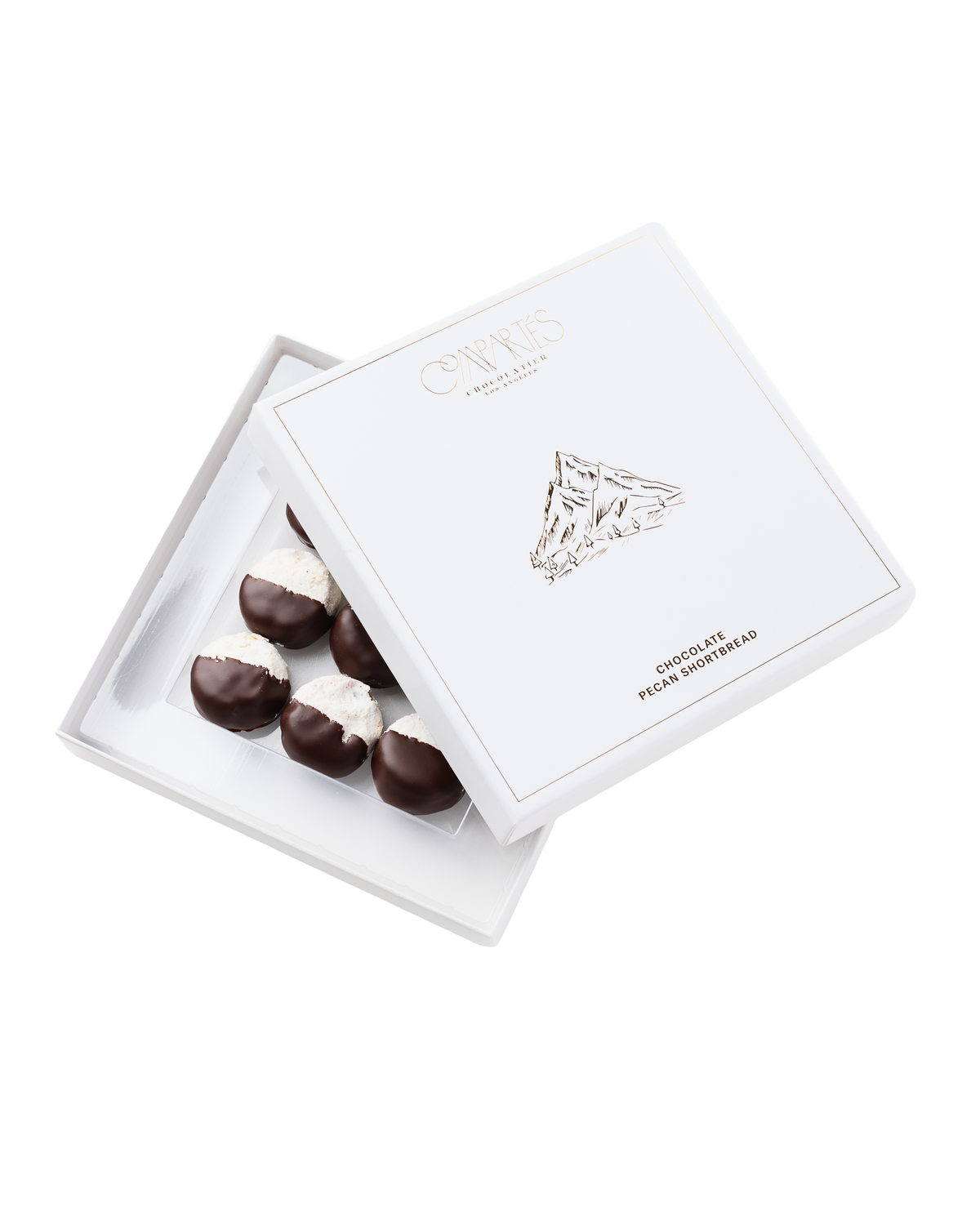 Compartes gourmet chocolate pecan shortbread cookies, white gift box with the lid set at an angle
