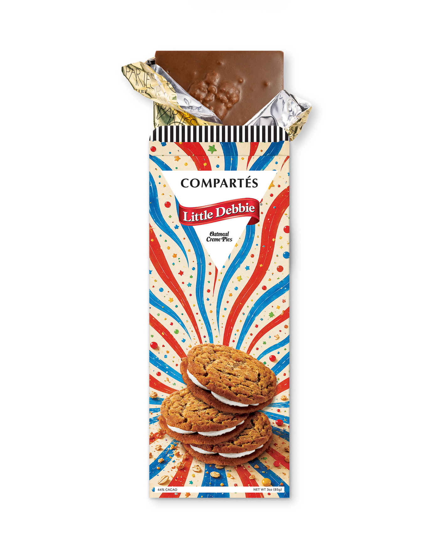A Compérés Little Debbie oatmeal creme pies bar in its wrapper, with the top foil partially peeled back to reveal a piece of chocolate. The wrapper features a red, white, and blue burst design with an illustration of oatmeal creme pies.