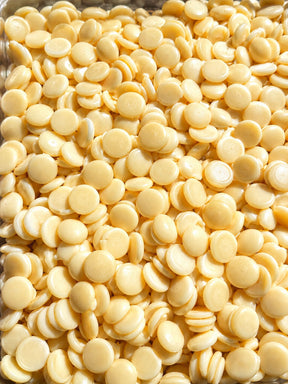 Gourmet White Chocolate Chips in bulk by Compartes Chocolatier. Handmade in Los Angeles, these pantry ingredients of premium white chocolate baking chips make the ultimate cookie ingredient.