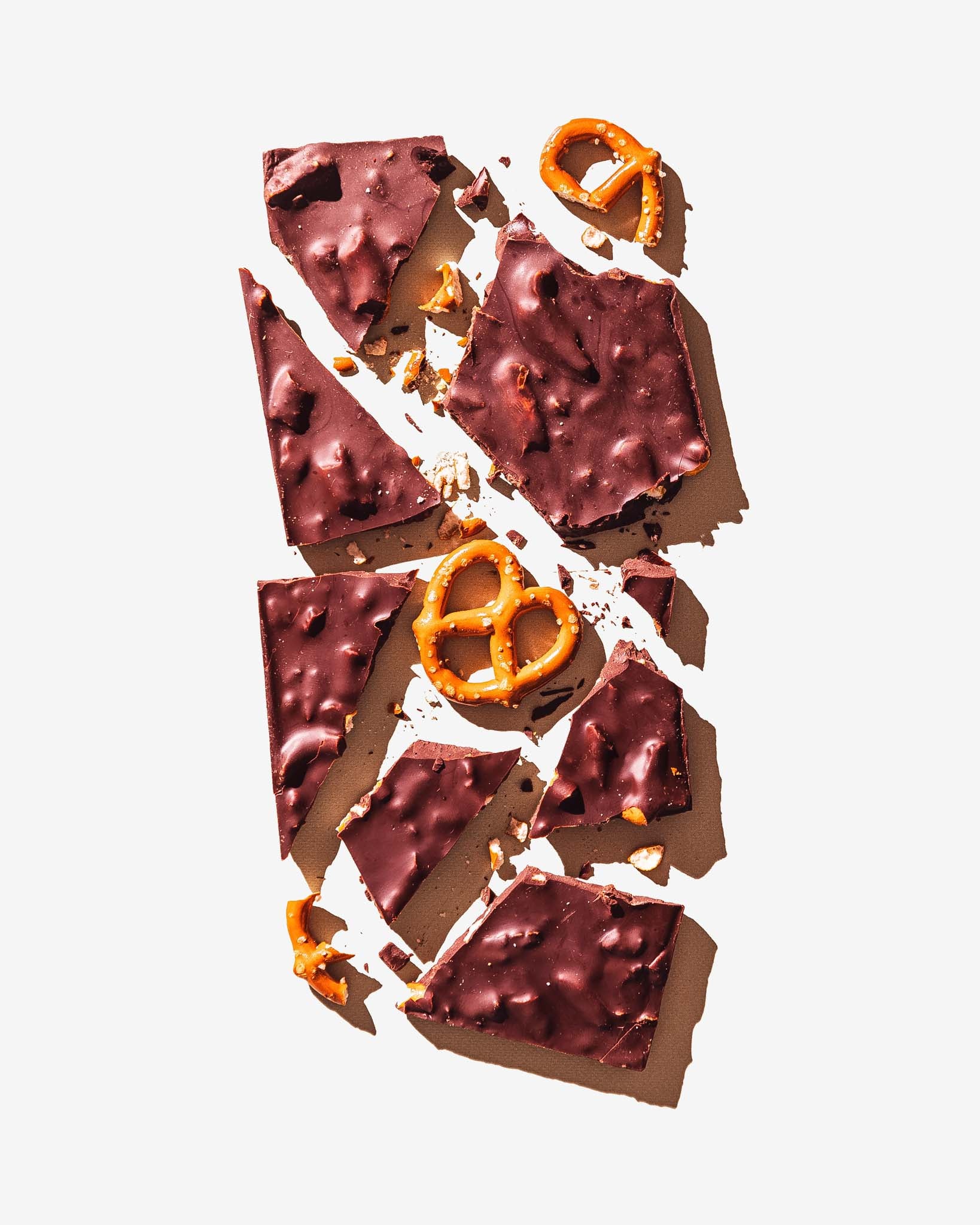 California Love Chocolate Pretzel Bar by Compartes, broken up into pieces	