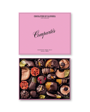 Compartes best chocolate covered fruits gift box, dipped orange and berries under a pink lid