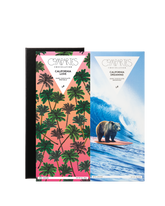Compartes best chocolate bar gift set, pink palm tree and surfing bear wrappers in a black box, pretzel and brownie