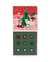 Compartes gourmet Christmas chocolate truffles gift box, red lid with pine trees and foxes, patterned truffles