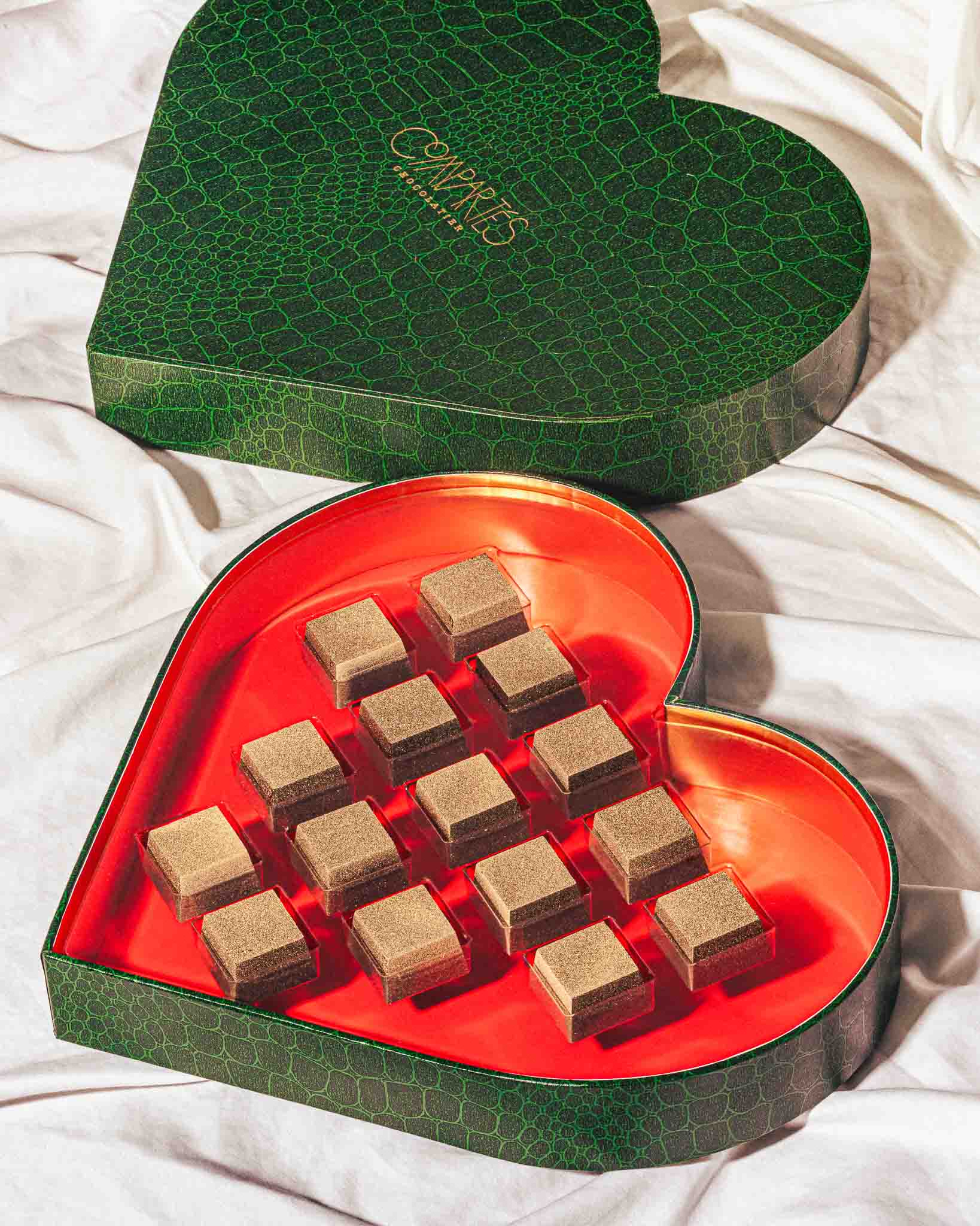 Valentine's Day 24 Karat Gold Moet Champagne Chocolates Box on a white background	