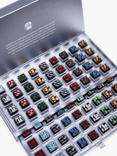 Compartes Silver Holiday Drawer Collection featuring 80 handcrafted holiday chocolates in a metallic silver gift box with seasonal designs.