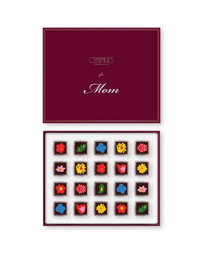 Compartes luxury floral truffles gift box, chocolate flowers in rich red and pink on dark squares