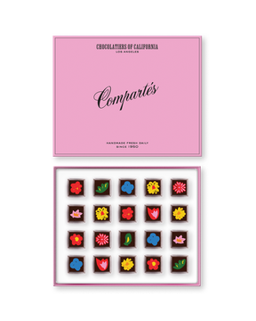 Compartes luxury floral chocolate truffles in a pink gift box, squares topped with flower designs