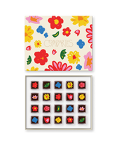 Compartes luxury floral truffles gift box, cream lid with flower art, chocolates topped with flower designs