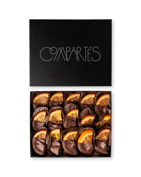Compartes gourmet chocolate gift box, dark chocolate dipped candied orange slices in a black box