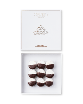 Compartes gourmet chocolate pecan shortbread cookies half dipped in dark chocolate, white gift box