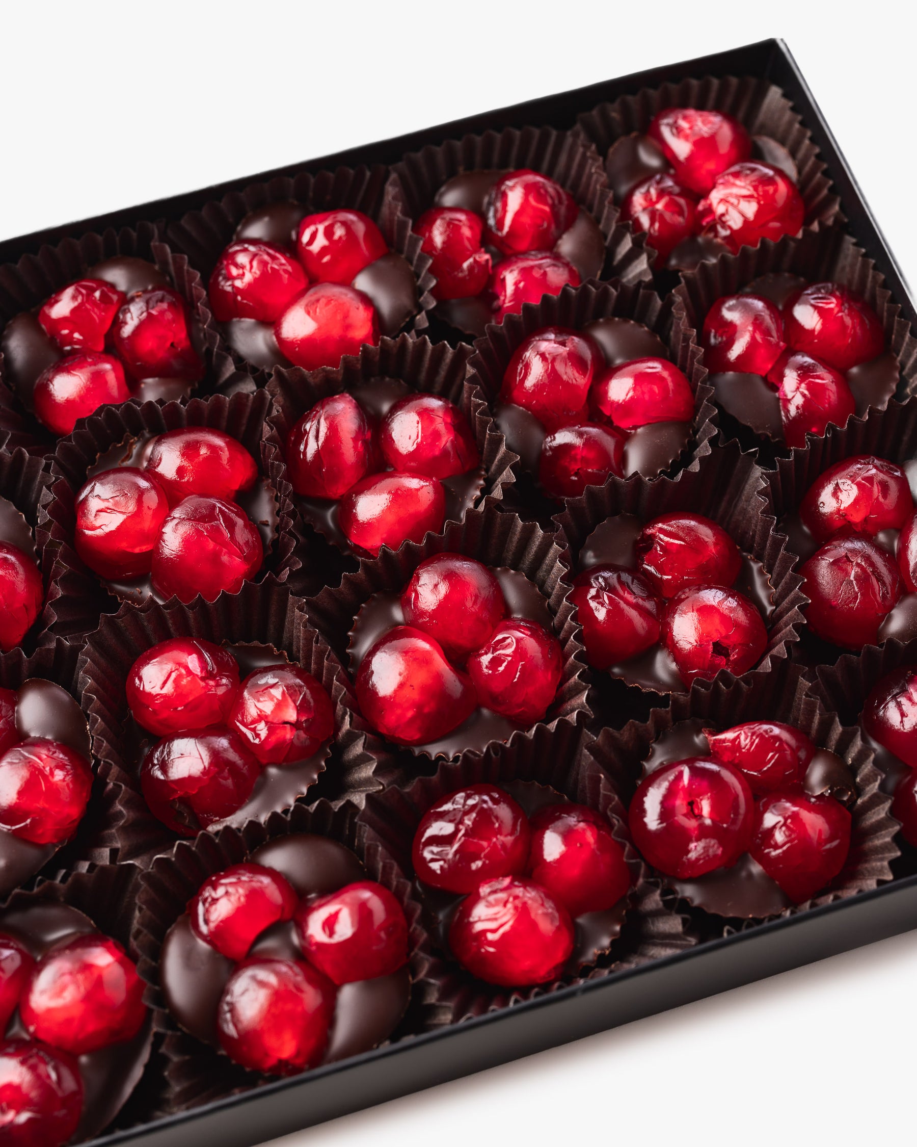 Close up of Compartés' chocolate covered cherries gift box