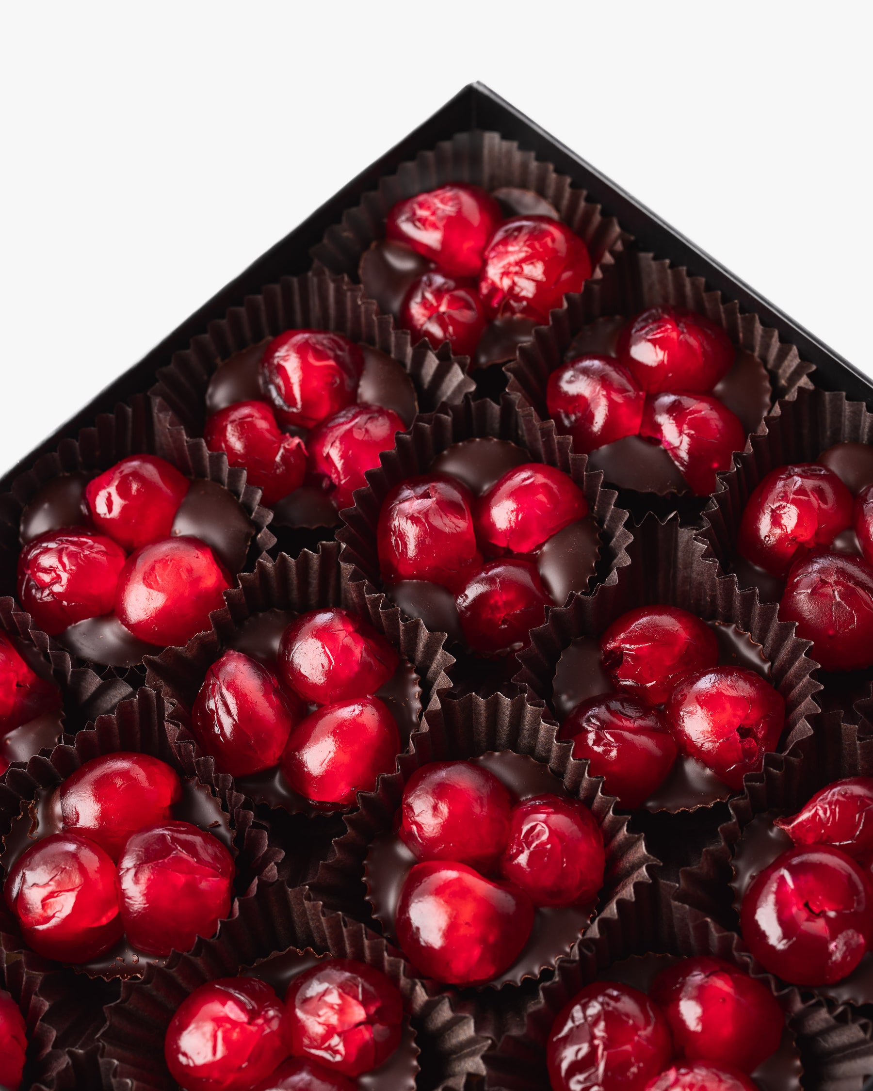 Close up of Compartés' chocolate covered cherries gift box