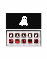 Compartes gourmet Halloween chocolates gift box, ghost and deep red squares in a black box, blood orange and marshmallow