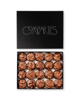 Compartes gourmet milk chocolate covered nuts, milk chocolate nut clusters in a black gift box