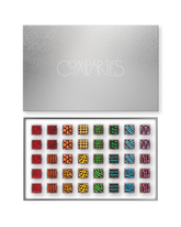 Compartes luxury signature chocolate truffles in a silver gift box, squares in rich red, green and blue patterns